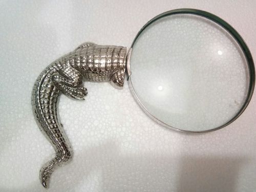 Magnifying glass with brass crocodile designed handle