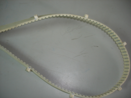 TIMING BELT WITH CLEATS