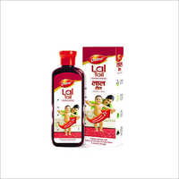 Dabur Lal Tail - Plastic Material, 100 Ml Size, Red Color | Ideal For Babies' Bone Health, Ages 2-5
