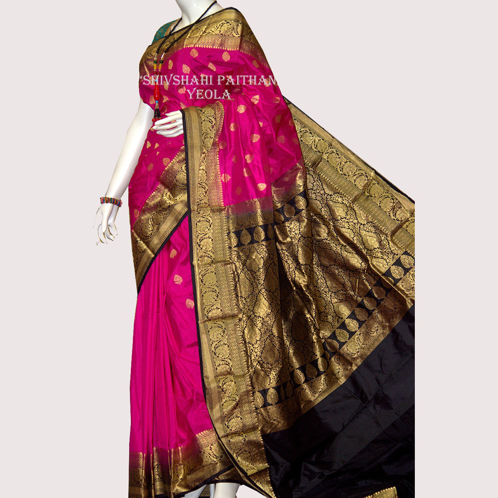 Kanchipuram pink silk saree with golden black border