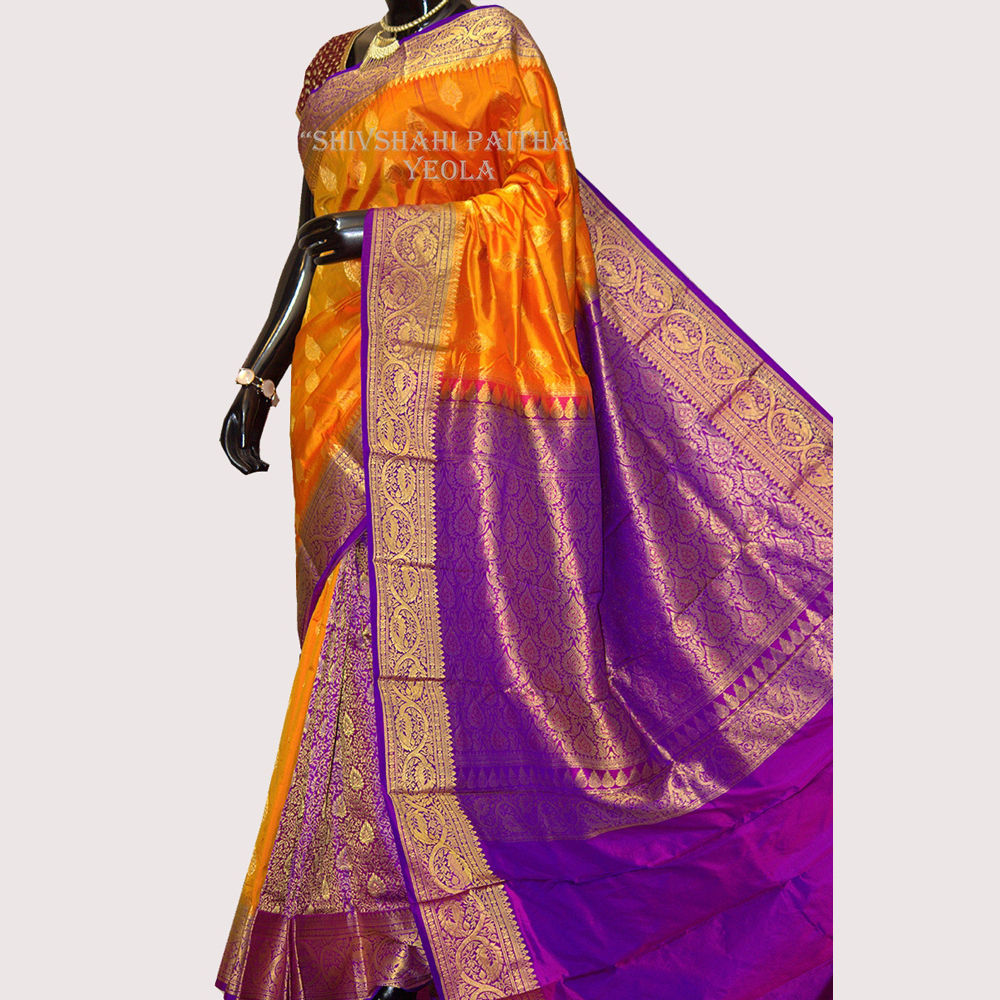 Kanchipuram dark yellow saree with golden blue border