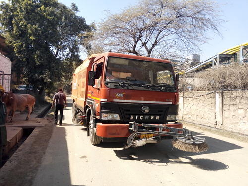 Sweeper Truck In Industrial Road