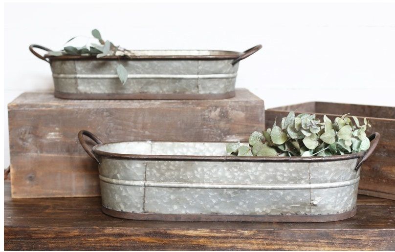 Set of two Weathered Metal Planters