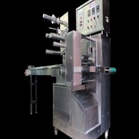 Chikki Packing Machine - Stainless Steel, 3120x1150x1580 Mm , Electric Drive, Semi-automatic Operation, User-friendly Design, Air Tight Packing, Hygienic Food Operation, Low Noise & High Efficiency