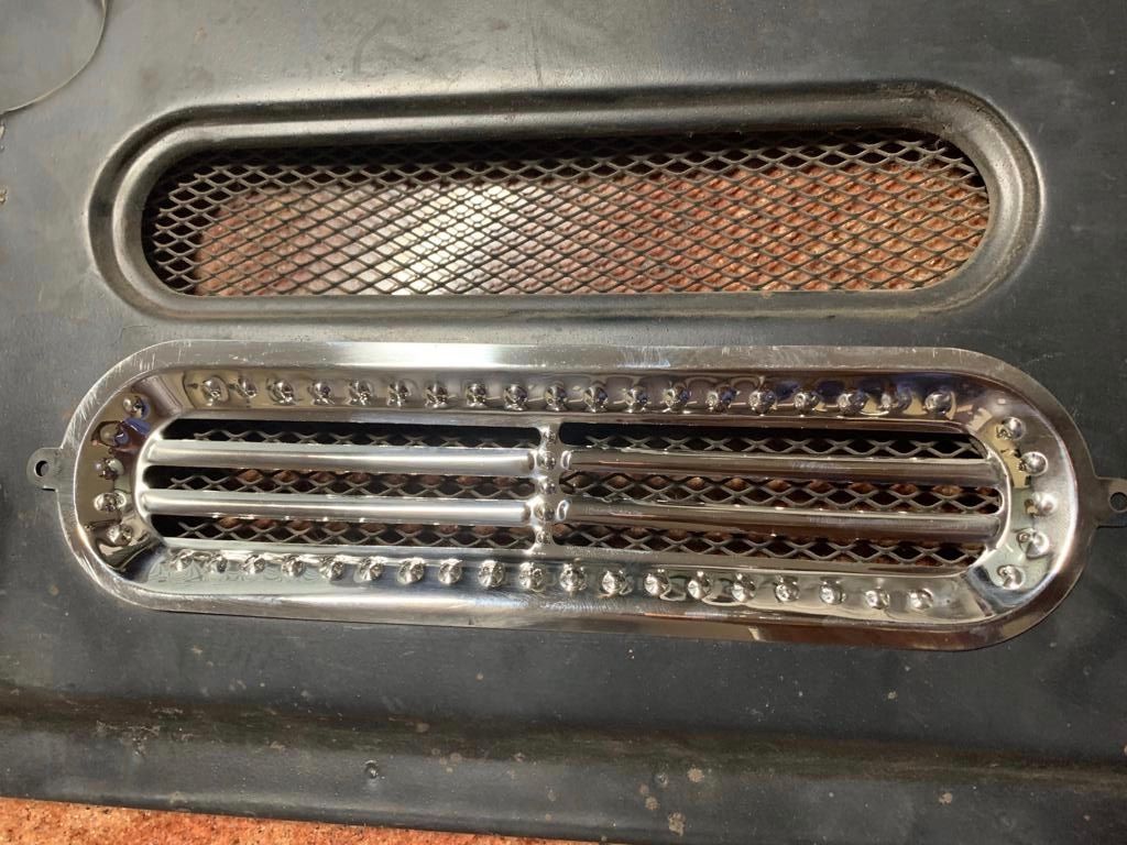 128 - REAR DOOR GRILL SHOW COVER