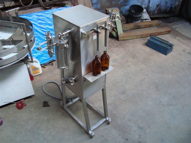 SEMI AUTOMATIC TWO HEAD FILLING MACHINE