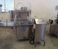 Automatic Four Head Volumetric Pesticide Filling Machine