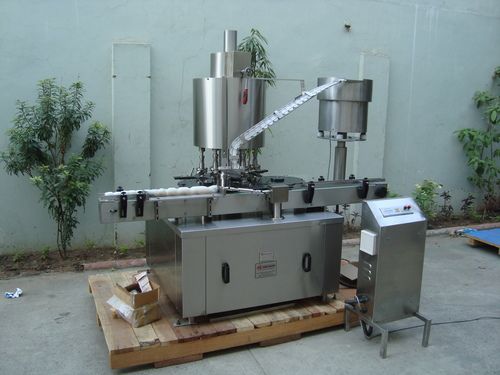 Automatic Four Head Screw Capping Machine Capacity: 10 Ml To 1000 Ml Kg/hr