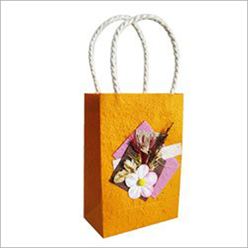 Decorative Paper Bag - Kraft Paper, Rope Handle , Plain Design, Security Feature, Disposable, Biodegradable, Customized Size & Designs