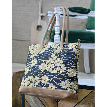 STYLISH HANDBAG WITH LEATHER TRIM