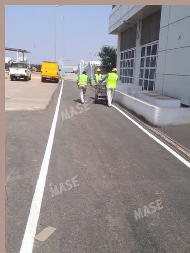 Line marking on bitumen surface