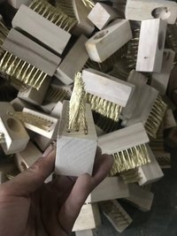 Strip brass brush