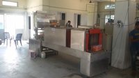 SHRINK WRAPPING MACHINE