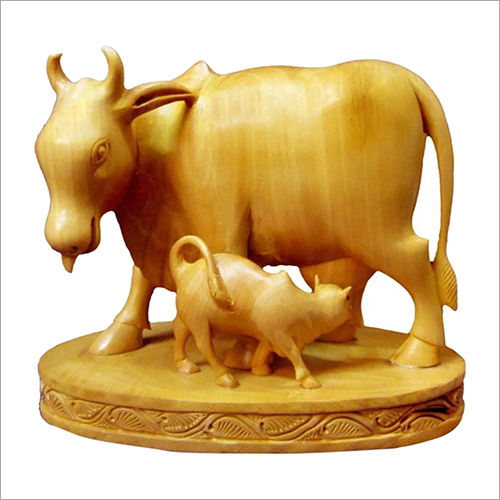 Polished Wooden Cow Sculpture