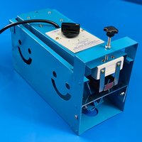 Debeaker Machine
