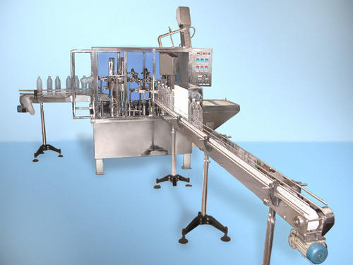 Fully Auto Pet Bottle Rinsing Filling and Capping Machine By MADHUSUDAN AQUA INDUSTRIES