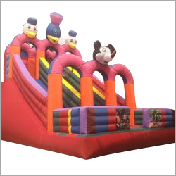 Kids Playing Inflatable Slide Castle