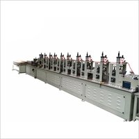 Paper angle board forming machine