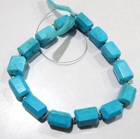 Natural Turquoise Magnasite free shape nugget Tumbled lazer cut beads.