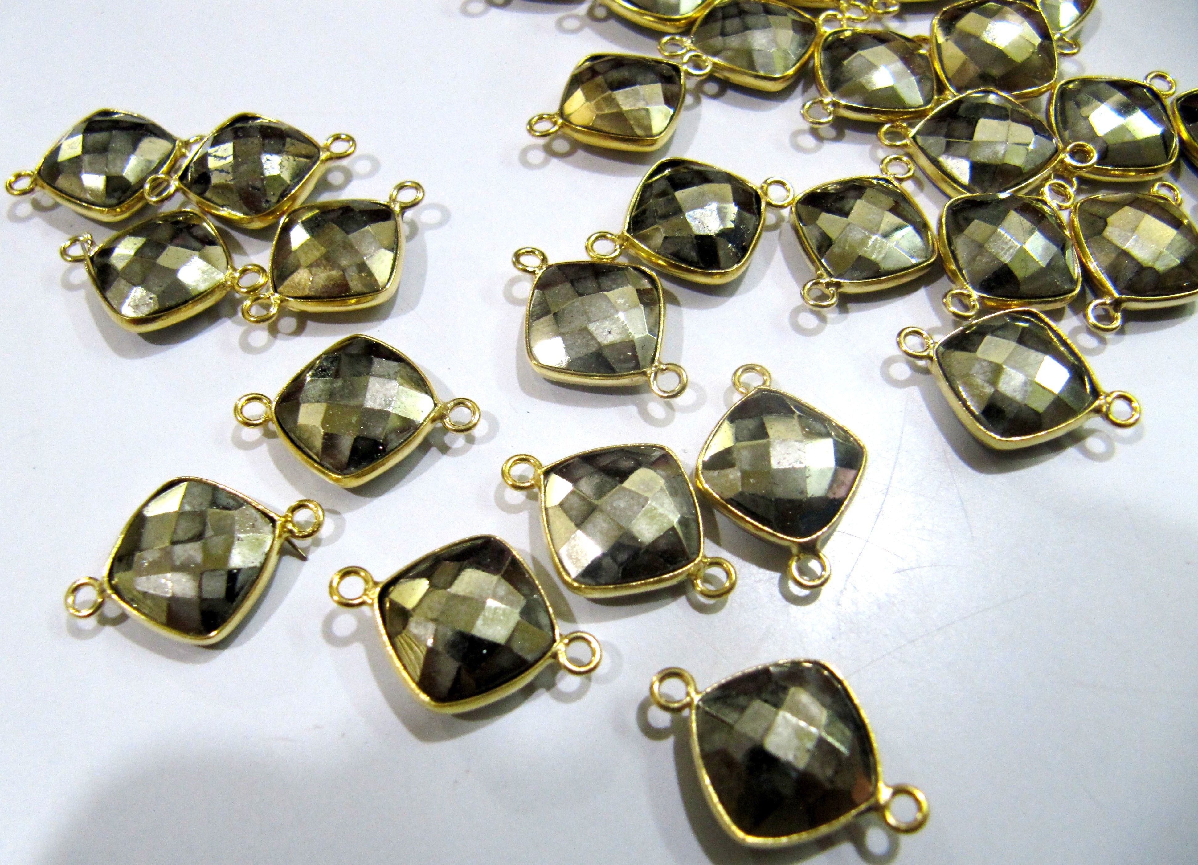 Natural pyrite double loop briolette connector Cushion shape size 11mm gold plated.