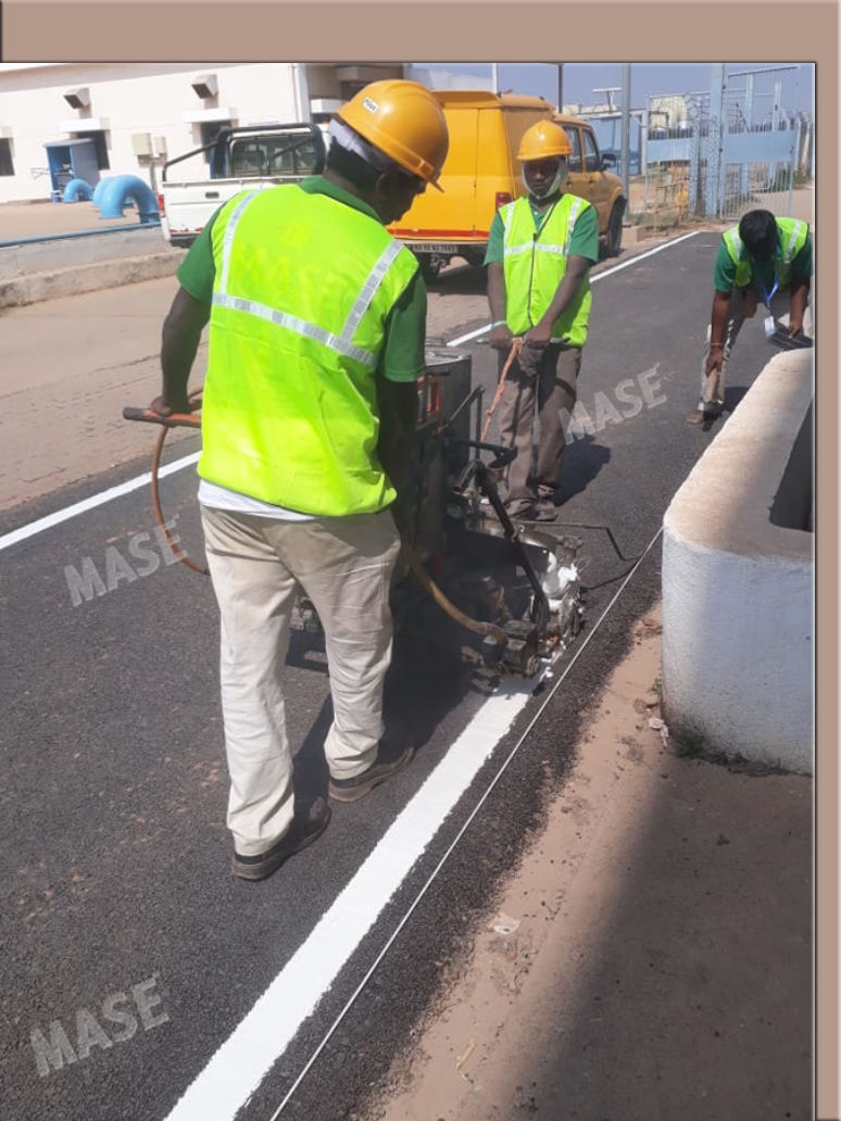 Line marking on bitumen surface