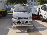 The Cleaning Of Pavement And Flyer Road Maintenance Vehicle