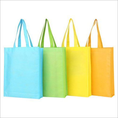 Non Woven Multicolored Shopping Bag - Plain Design, Loop Handle Style for Convenient Carrying