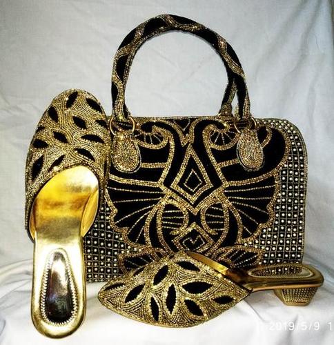 black & golden shoes & bag black & golden shoes & bag