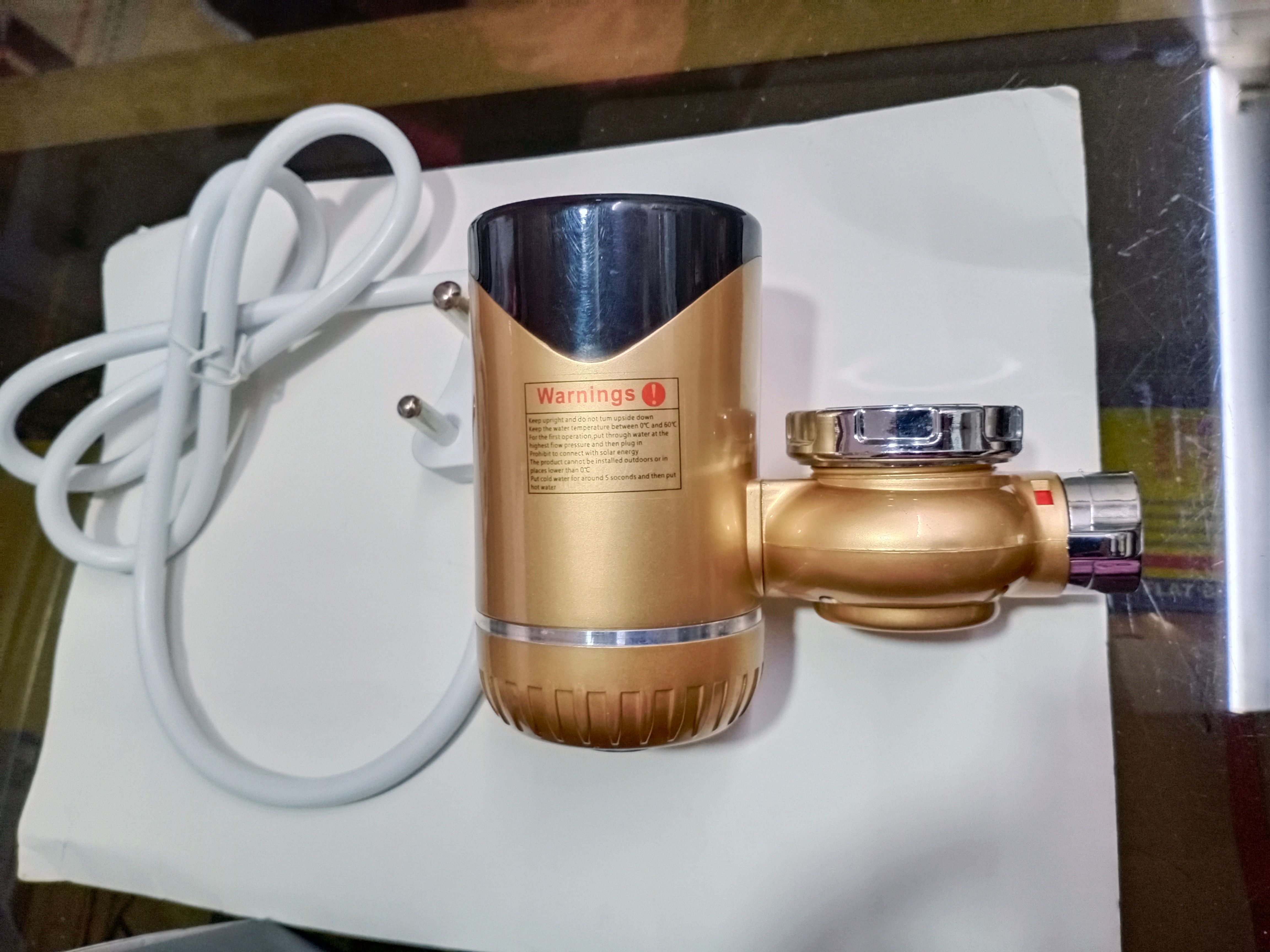 INSTANT HOT WATER DEVICE