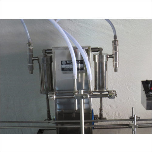 Two Head Fully Automatic Liquid Filling Machine - Material: Ss