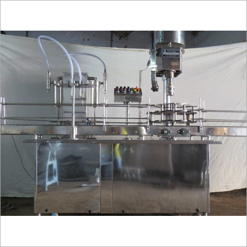 Glass Bottle Filling Machine - Material: Ss