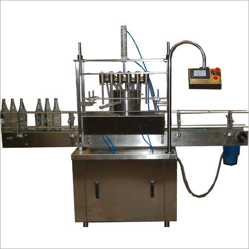 Four Head Volumetric Liquid Filling Machine