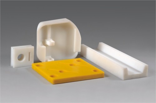 Yellow And White Plastic Automotive Component