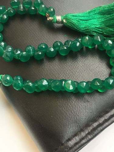 Green onyx onion faceted beads, 8 inch strand,6.5-7mm approx