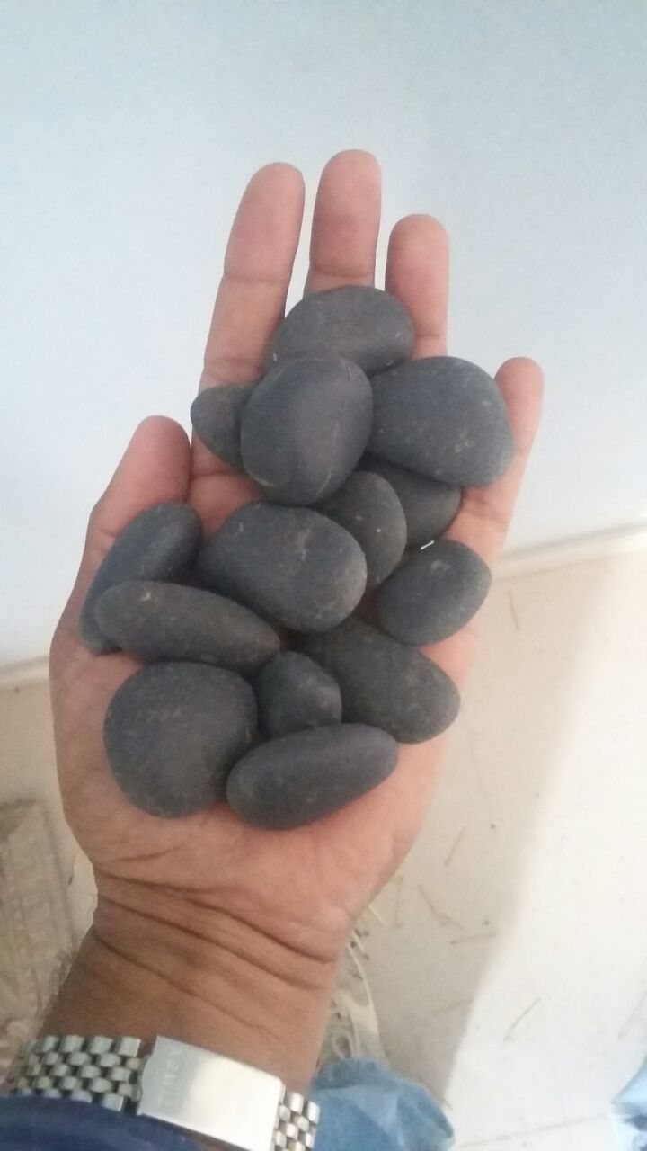 Indian stockist of River black pebbles stone