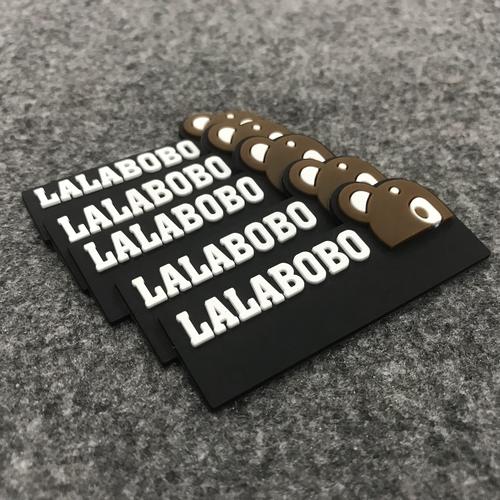 Clothing Label - Rubber, Varied Dimensions, Black | Sewn Attachment, Customizable Logo & Text, High Durability, Stylish & Professional Look