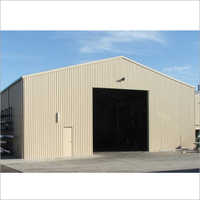 Industrial Warehouse Shed - Galvanized Steel, Customizable Dimensions , Gable Roof With Corrugated Wall Panels And Roll-up Door