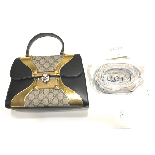 Gucci Black Gold GG Canvas Handbags