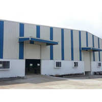 Commercial Sheds - Steel Structure, Galvanized Steel Walls | Metal Roof, Rolling Doors, Customizable Dimensions, Concrete Foundation, Aluminum Windows