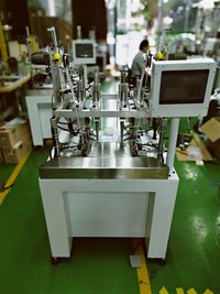Four-point welding earband machine