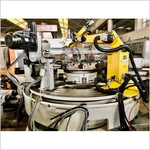 TRANSFER machine with FIBROTAKT rotary indexing table and ROBOT - ATOM 10.