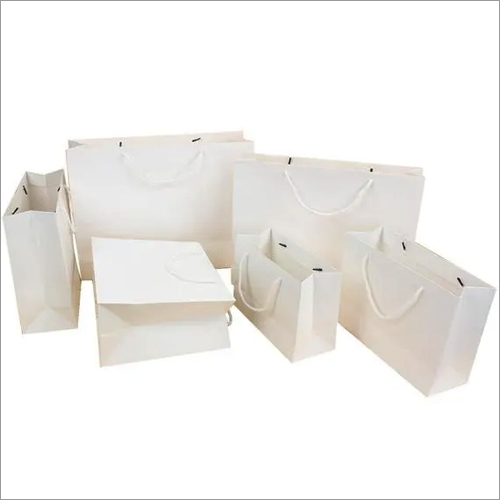 White Paper Bags - Paper Material, Varied Dimensions, White Color | Customizable, Durable, Eco-friendly, Lightweight, Strong, Stylish, Versatile, Twisted Paper Handles