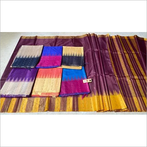 PURE TUSSAR SILK HANDCRAFTED TEMPLE BORDER WITH BOOTI WOVEN SAREES .