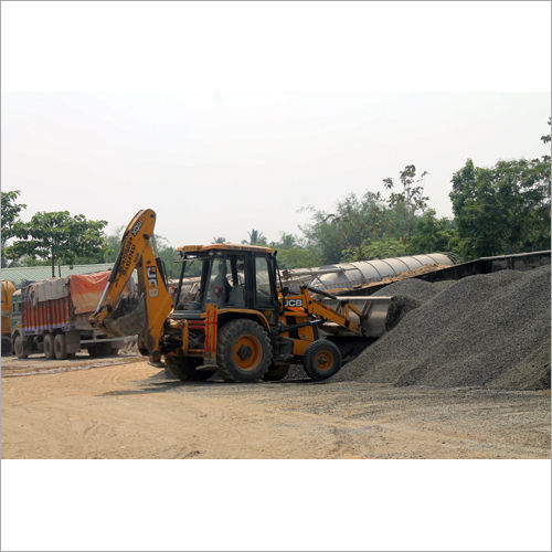 JCB Picking Up Stone Chips