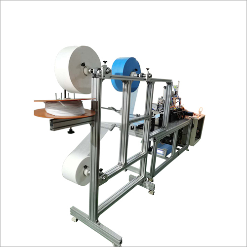 7 Servo One Drag One Face Mask Making Machine