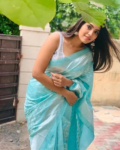 Indian Traditional Beautiful young girl in saree posing outdoors 4982424  Stock Photo at Vecteezy