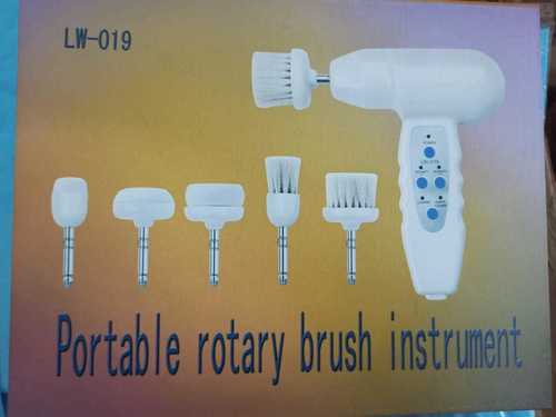 Portable rotary brush instrument