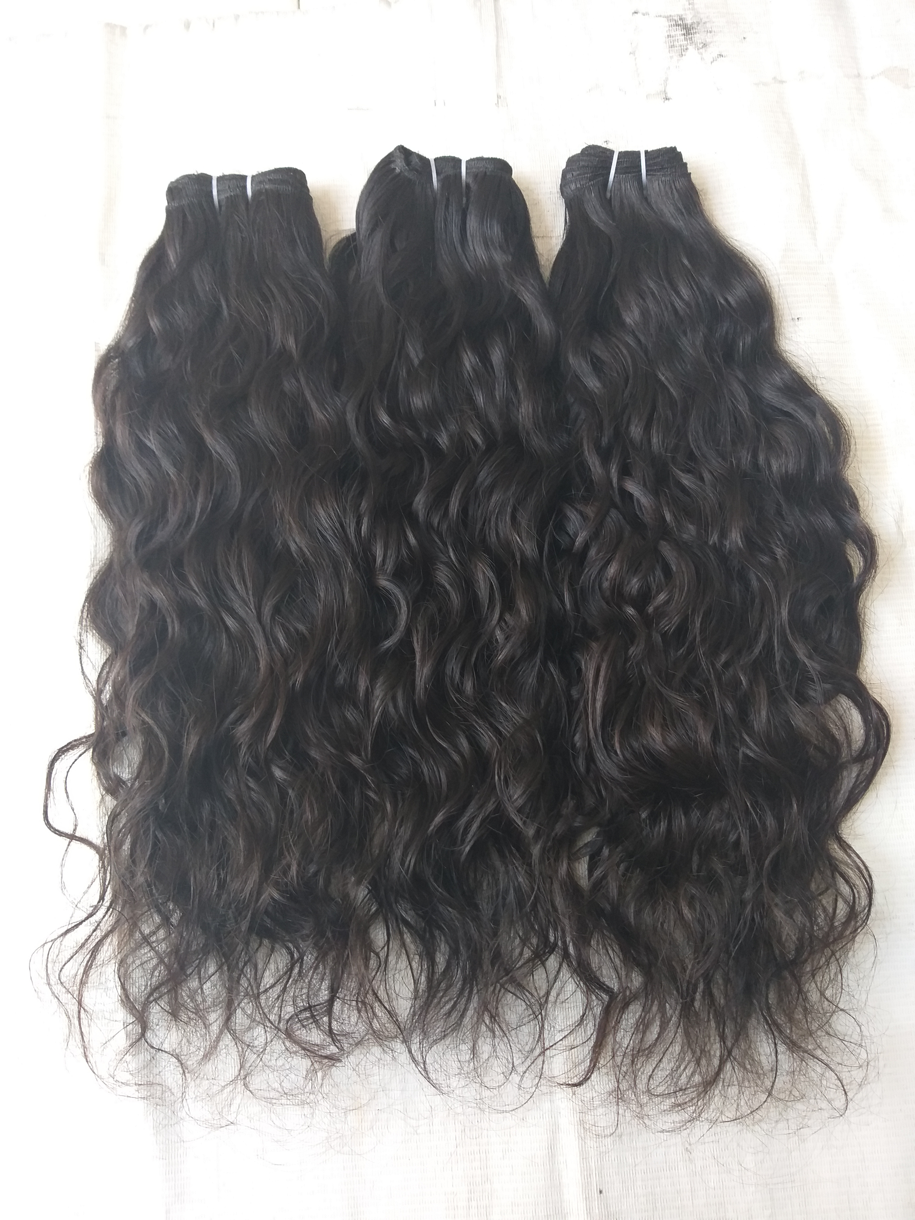 Raw Unprocessed Indian Wavy Human best hair extensions