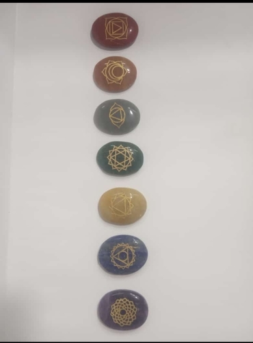 chakra oval stone with engraving