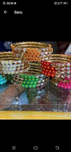 Gold matel bangles with kundan work
